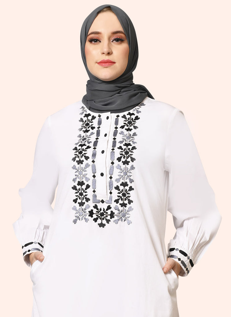 women wearing white abaya with grey Embroidery 