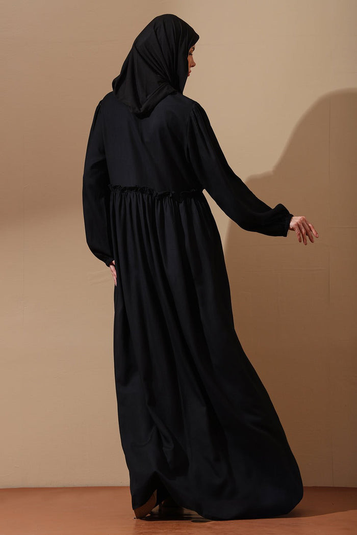 Elegant Black Abaya with Blue Embroidered Bodice - EastEssence.com