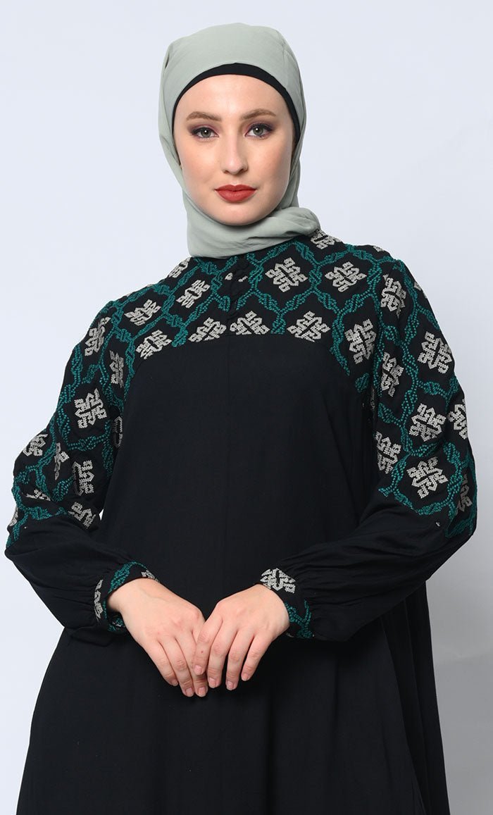 Elegant Simplicity: Embroidered Black Abaya with Box Pleats and Dual Pockets - Final Sale - EastEssence.com