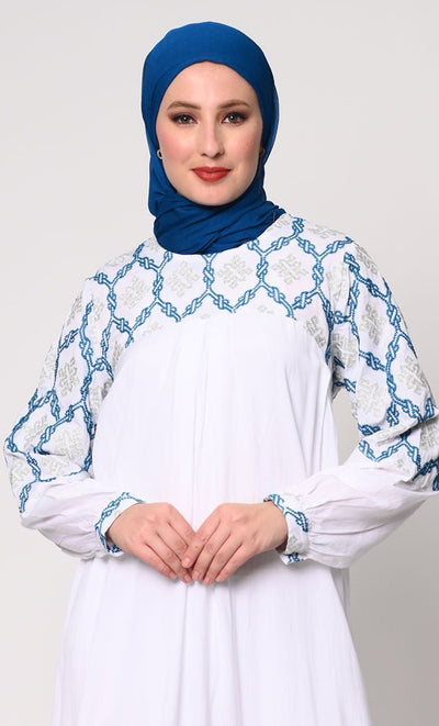 Elegant Simplicity: Embroidered White Abaya with Box Pleats and Dual Pockets - Final Sale - EastEssence.com