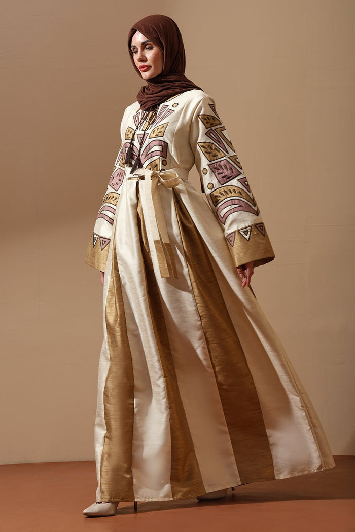 Regal Embroidered Silk Abaya in Ivory & Gold with Tribal Motif - EastEssence.com