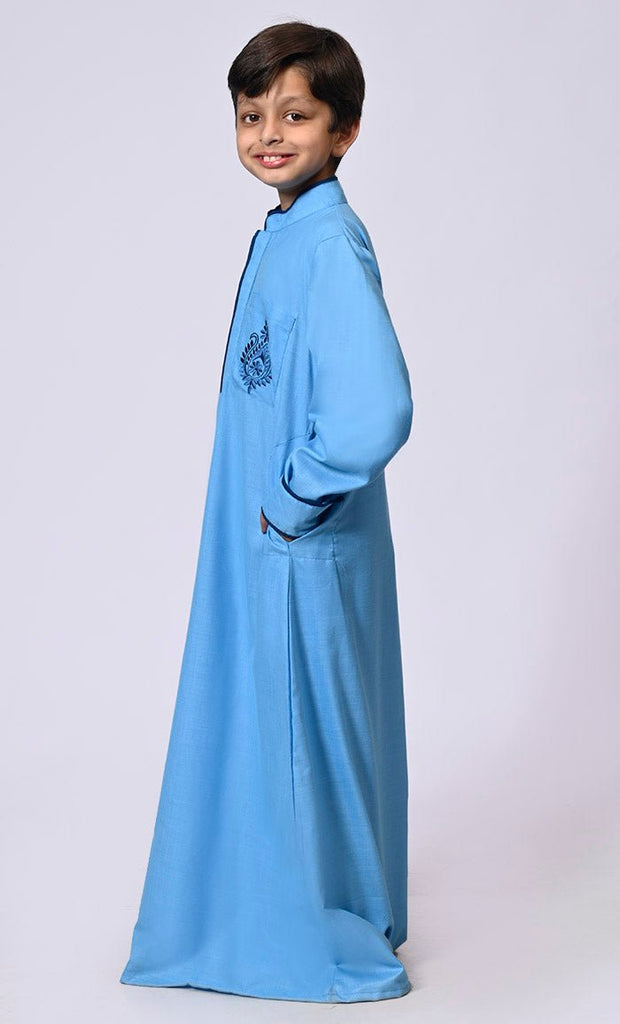 Elevated Elegance: Embroidered Boy's Blue Thobe with Contrast Accents - EastEssence.com