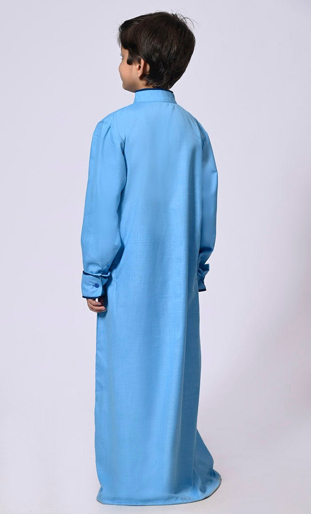 Elevated Elegance: Embroidered Boy's Blue Thobe with Contrast Accents - EastEssence.com