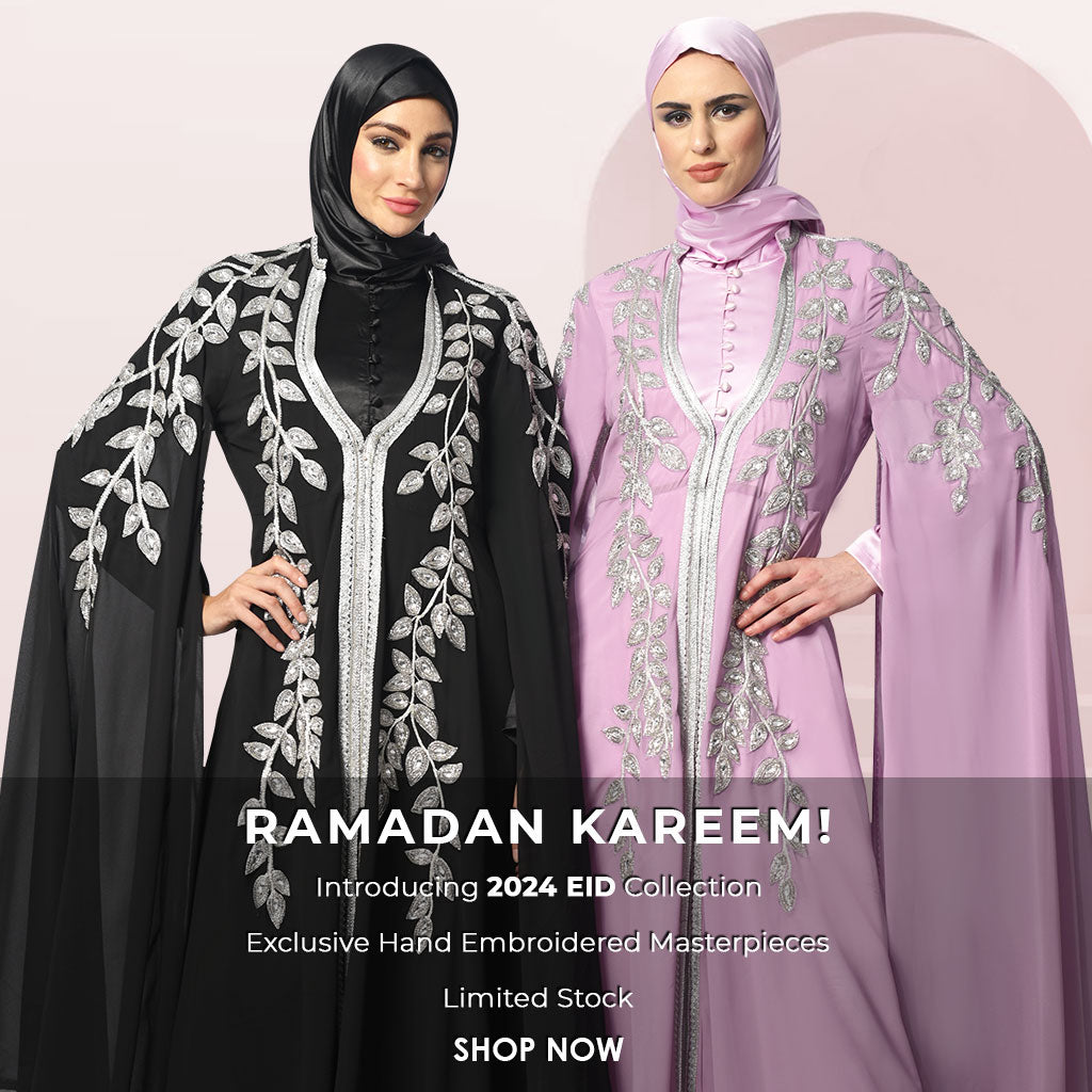 women wearing black and pink abaya
