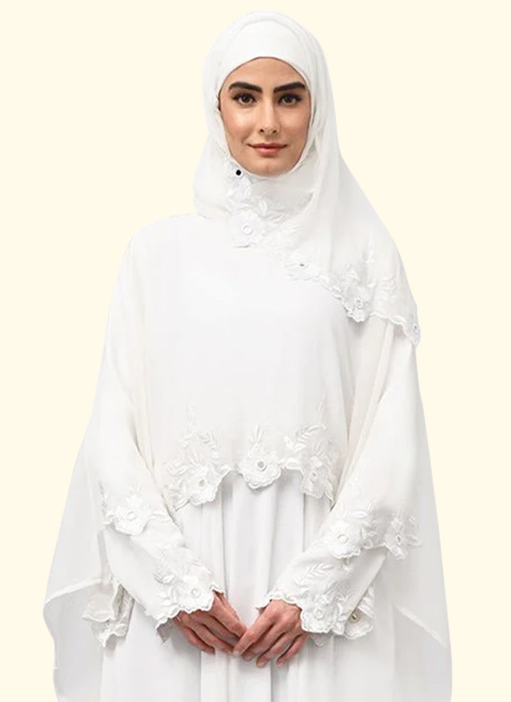 Women wearing white abaya with beautiiful white Embroidery