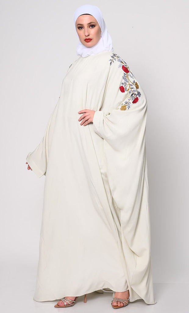 Beautiful Floral Embroiderd Ivory Kaftan with Pockets - EastEssence.com