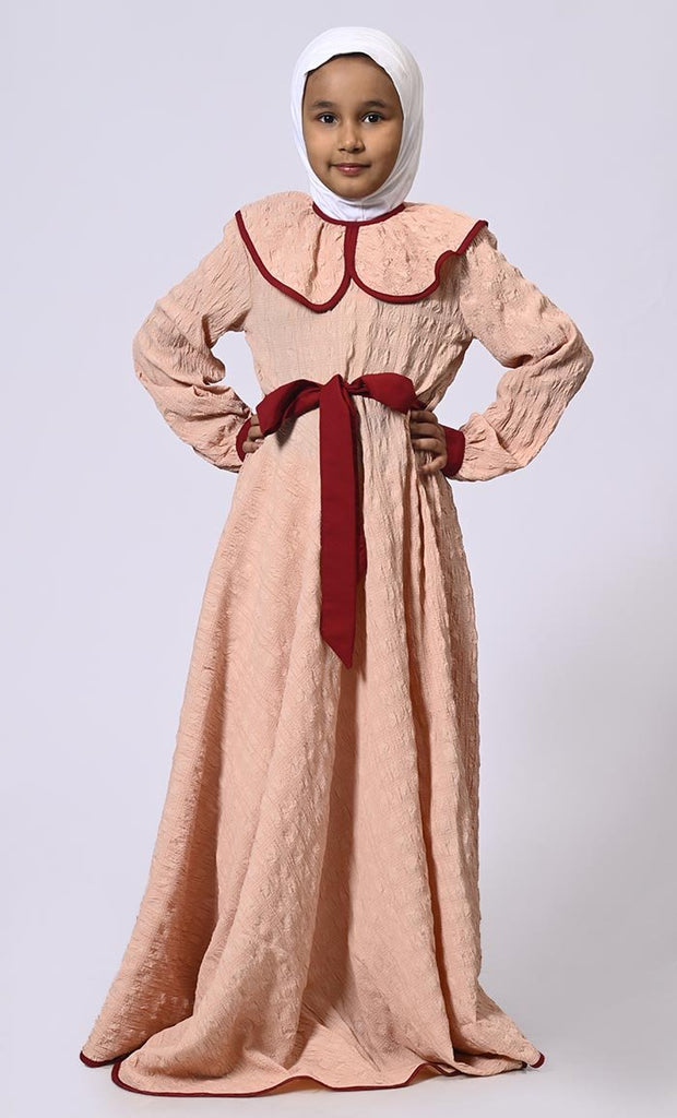 Chic Charm: Girls' Peach Abaya with Peter Pan Collar and Loose Belt - EastEssence.com