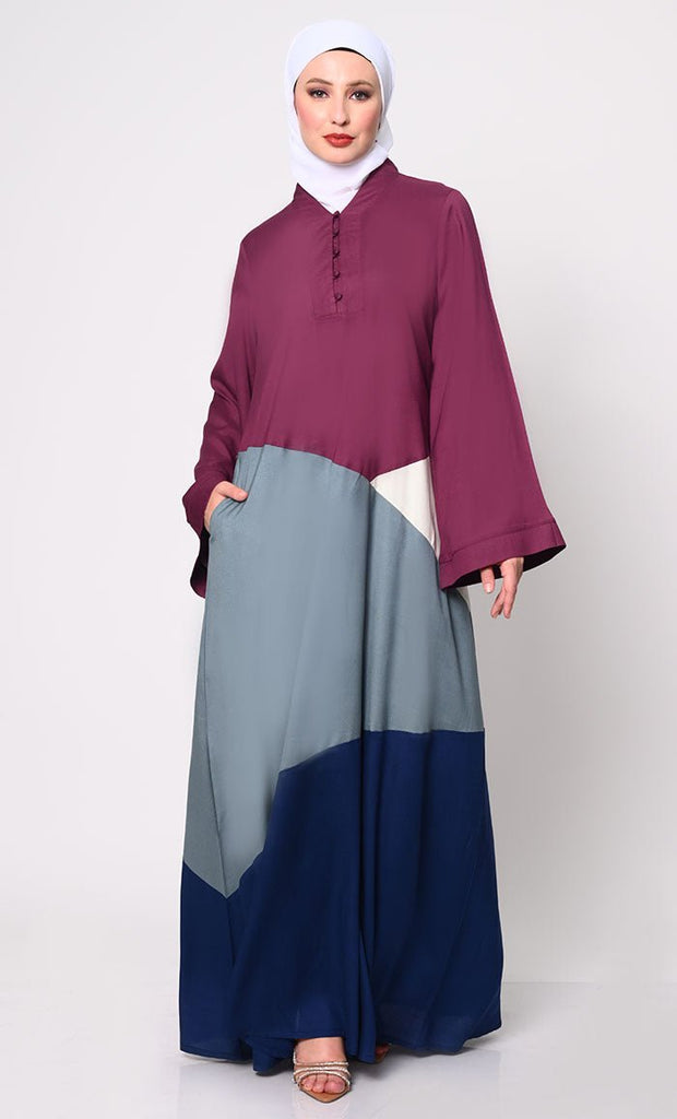 Contemporary Elegance: Abaya with Captivating Color - Blocking Panels and Practical Pockets - EastEssence.com