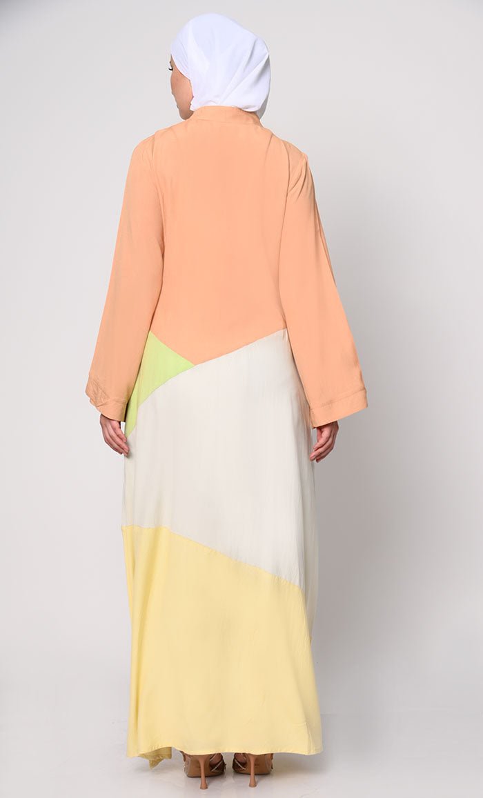 Contemporary Elegance: Abaya with Pastel Color - Blocking Panels and Practical Pockets - EastEssence.com