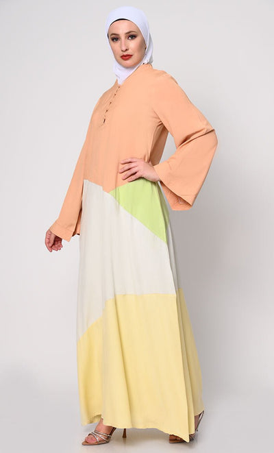 Contemporary Elegance: Abaya with Pastel Color - Blocking Panels and Practical Pockets - EastEssence.com