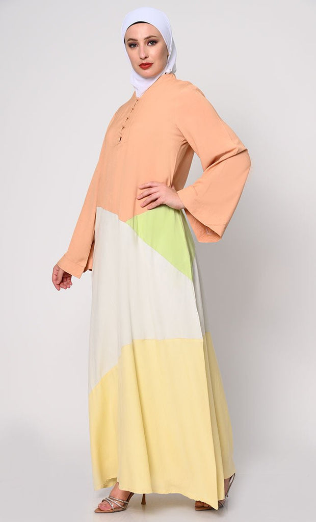 Contemporary Elegance: Abaya with Pastel Color - Blocking Panels and Practical Pockets - EastEssence.com