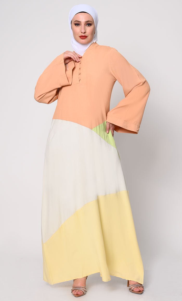 Contemporary Elegance: Abaya with Pastel Color - Blocking Panels and Practical Pockets - EastEssence.com