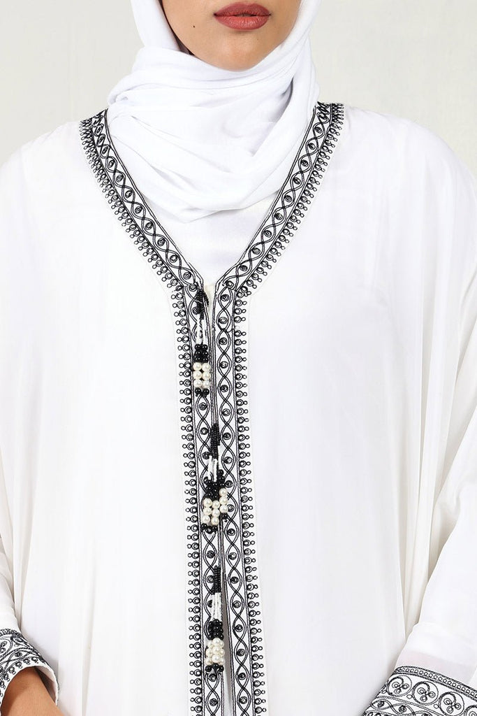 Elegant Georgette Kaftan Abaya with Cord Embroidery & Tassel Detailing - White - EastEssence.com