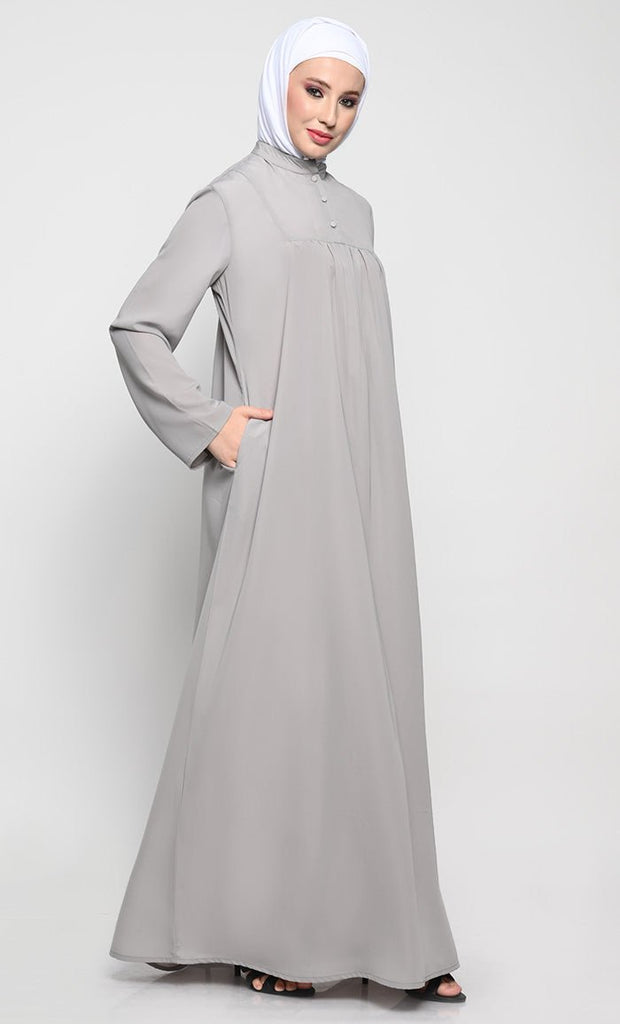 Elegant Nida Fabric Modest Abaya with Bell Sleeves and Chest Pleats - EastEssence.com