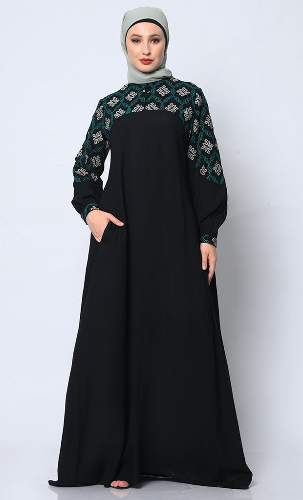 Elegant Simplicity: Embroidered Black Abaya with Box Pleats and Dual Pockets - Final Sale - EastEssence.com