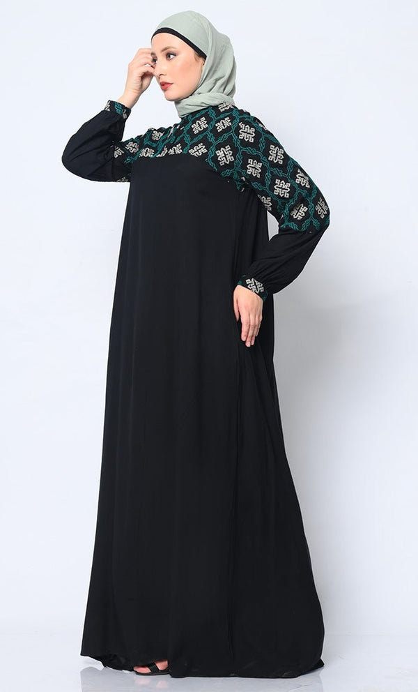 Elegant Simplicity: Embroidered Black Abaya with Box Pleats and Dual Pockets - Final Sale - EastEssence.com