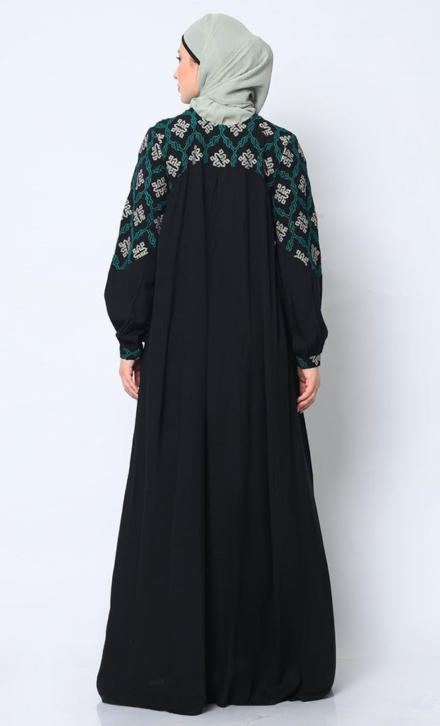 Elegant Simplicity: Embroidered Black Abaya with Box Pleats and Dual Pockets - Final Sale - EastEssence.com