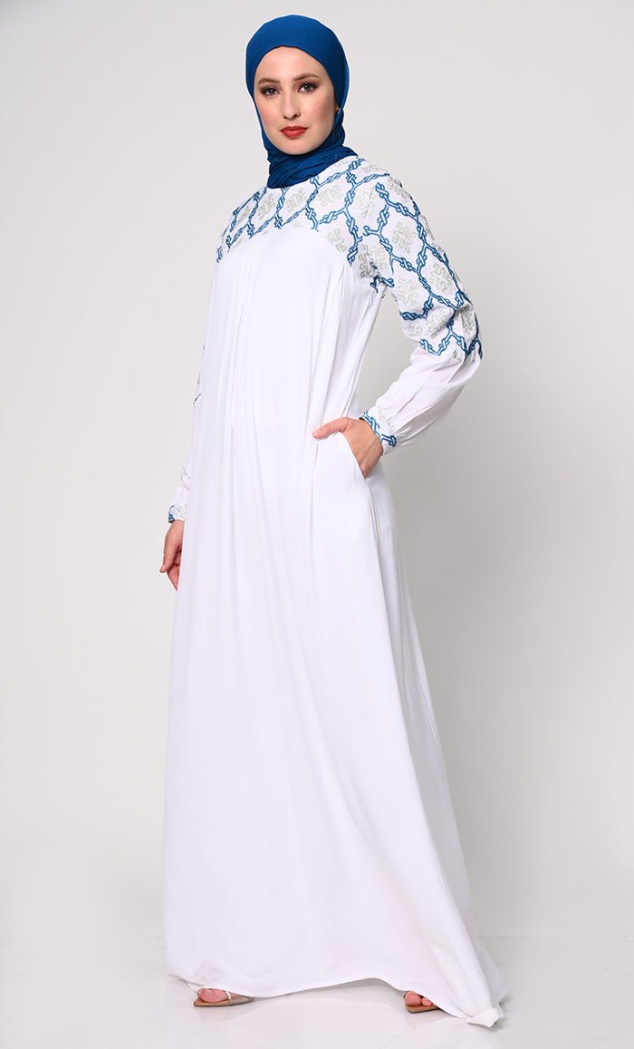 Elegant Simplicity: Embroidered White Abaya with Box Pleats and Dual Pockets - EastEssence.com