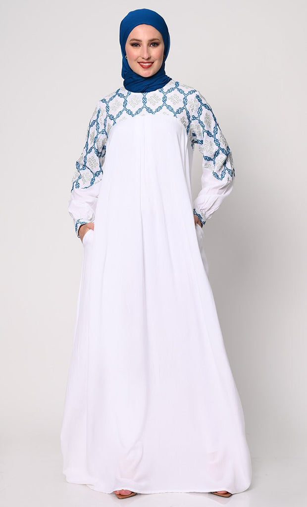 Elegant Simplicity: Embroidered White Abaya with Box Pleats and Dual Pockets - EastEssence.com