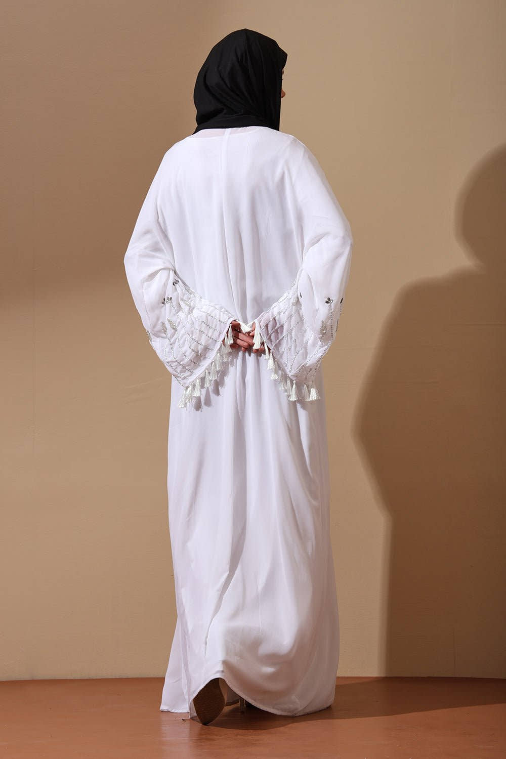 Elegant White Abaya with Embroidered Tassel Sleeves - EastEssence.com