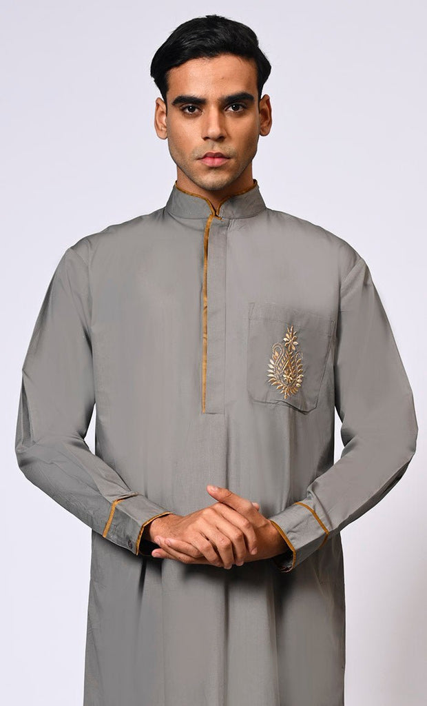 Elevated Elegance: Embroidered Men's Grey Thobe with Contrast Accents - Final Sale - EastEssence.com