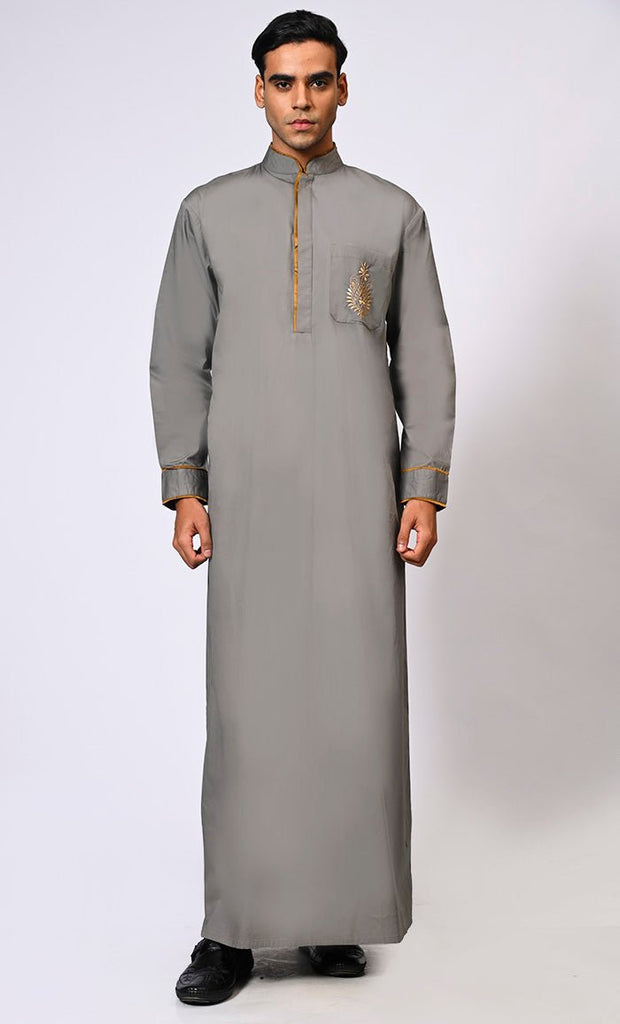 Elevated Elegance: Embroidered Men's Grey Thobe with Contrast Accents - Final Sale - EastEssence.com