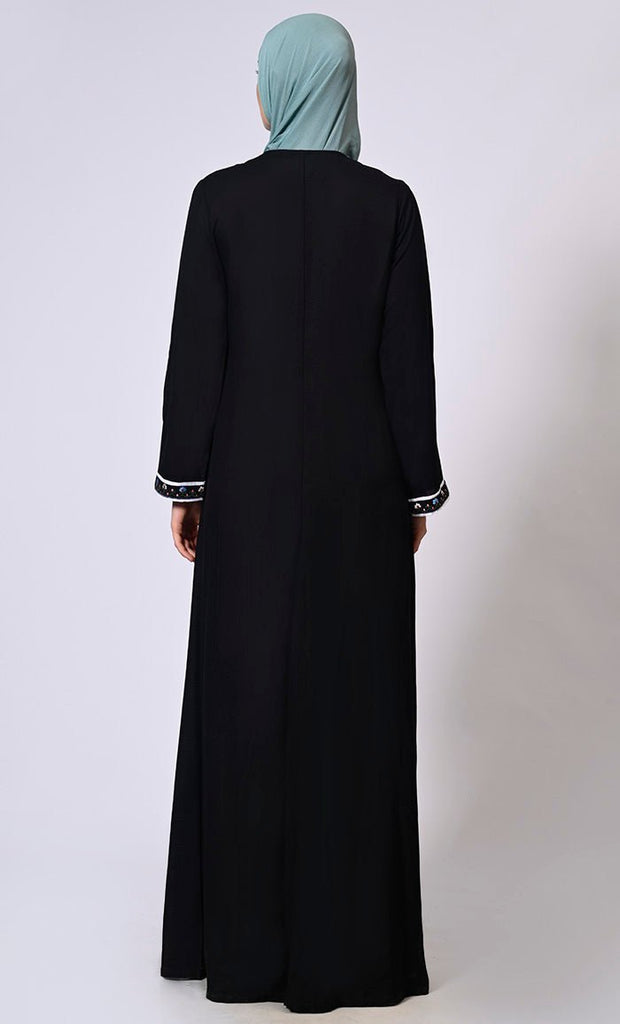 Feminine Flourish: Embroidered Front Zip Black Abaya with Front Pockets - Final Sale - EastEssence.com