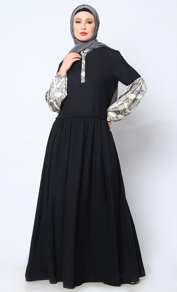 Mystic Bloom: Printed Black Abaya with Low Waist Gathers and Pockets - EastEssence.com