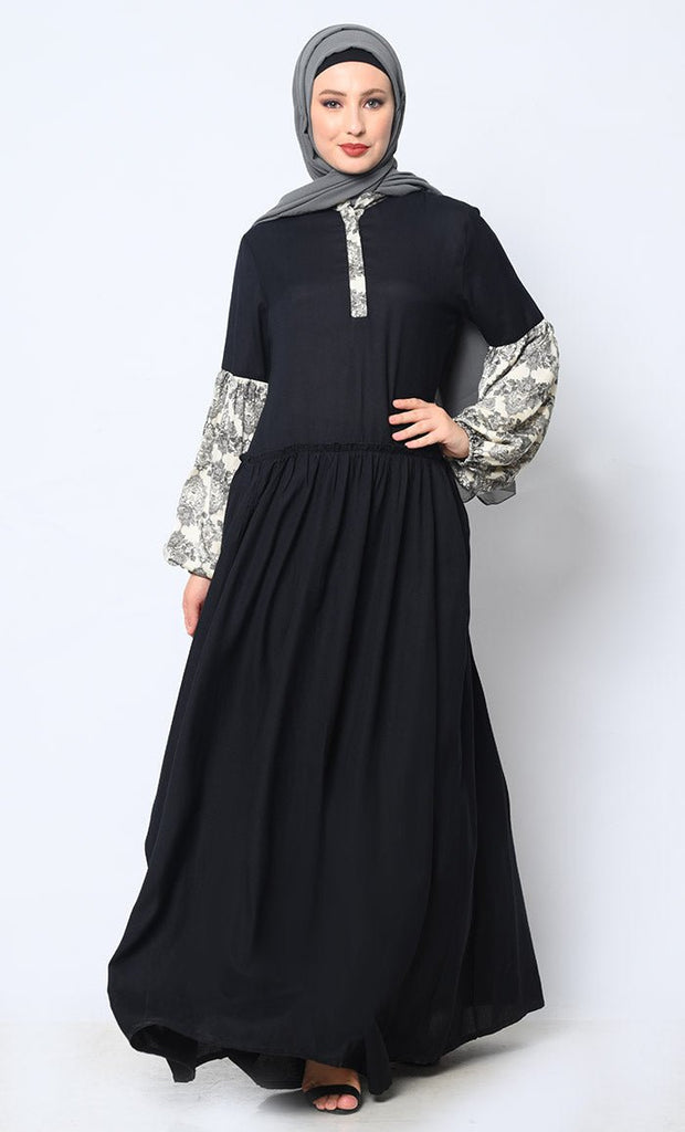 Mystic Bloom: Printed Black Abaya with Low Waist Gathers and Pockets - EastEssence.com