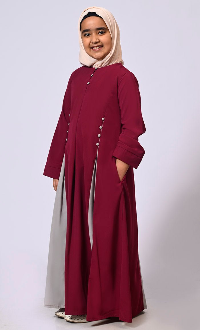 Pleated Perfection: Girl's Maroon Abaya with buttons detailing & Side Pockets - EastEssence.com