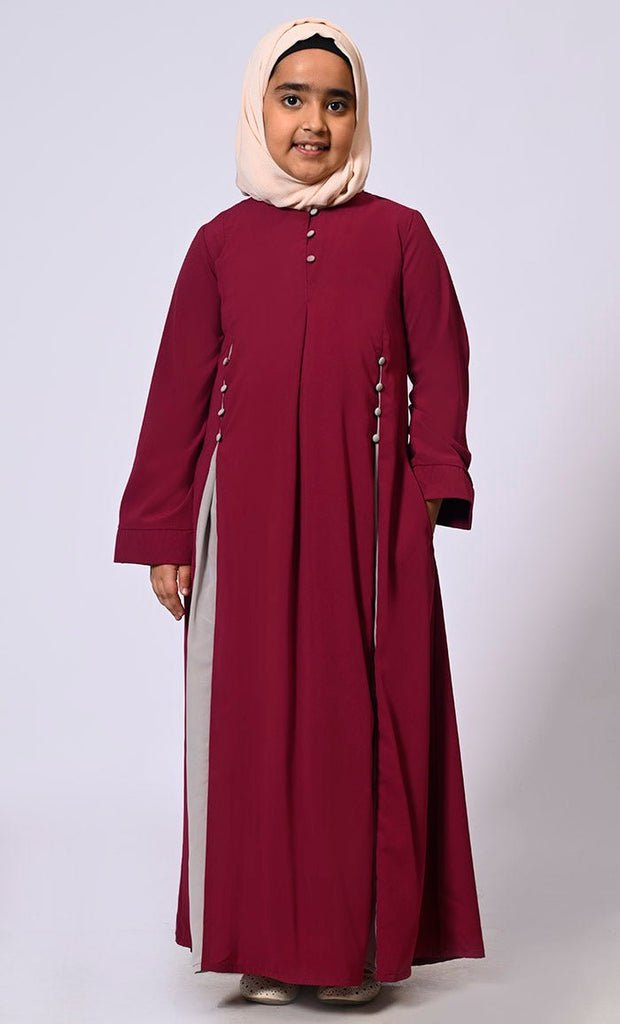 Pleated Perfection: Girl's Maroon Abaya with buttons detailing & Side Pockets - EastEssence.com