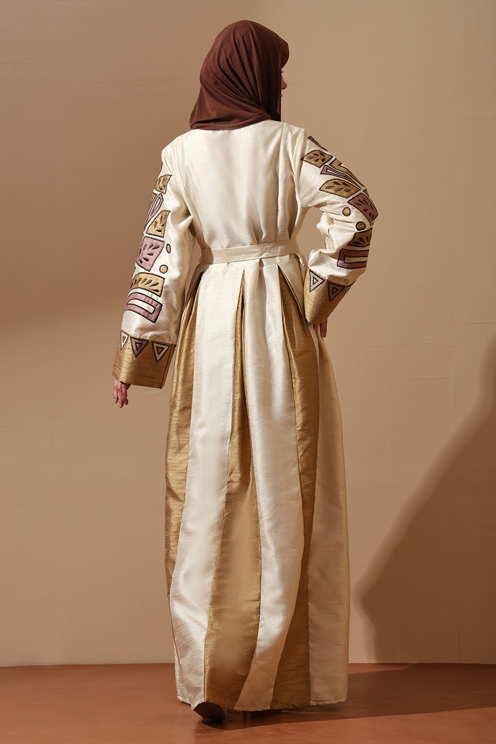 Regal Embroidered Silk Abaya in Ivory & Gold with Tribal Motif - EastEssence.com