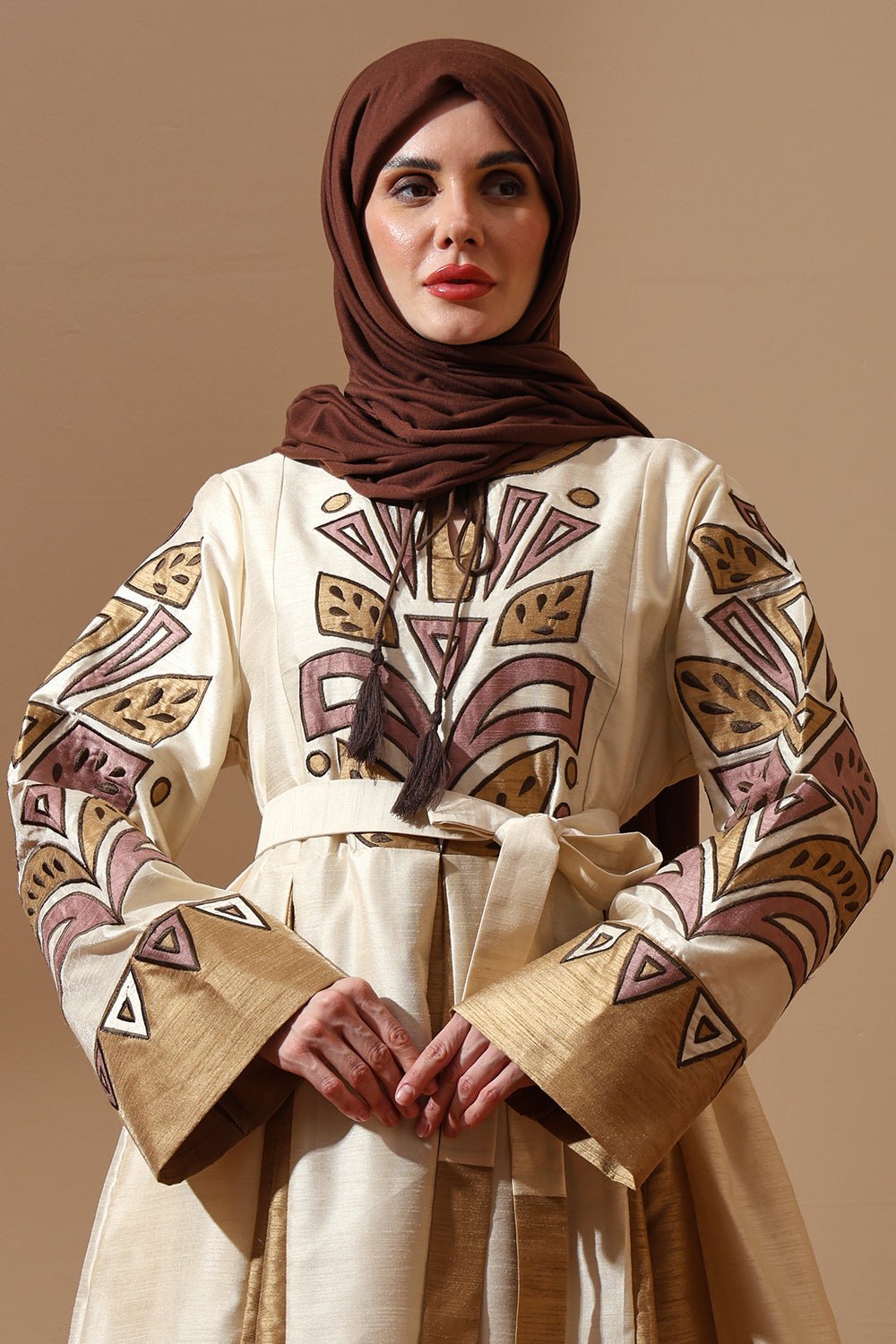 Regal Embroidered Silk Abaya in Ivory & Gold with Tribal Motif - EastEssence.com