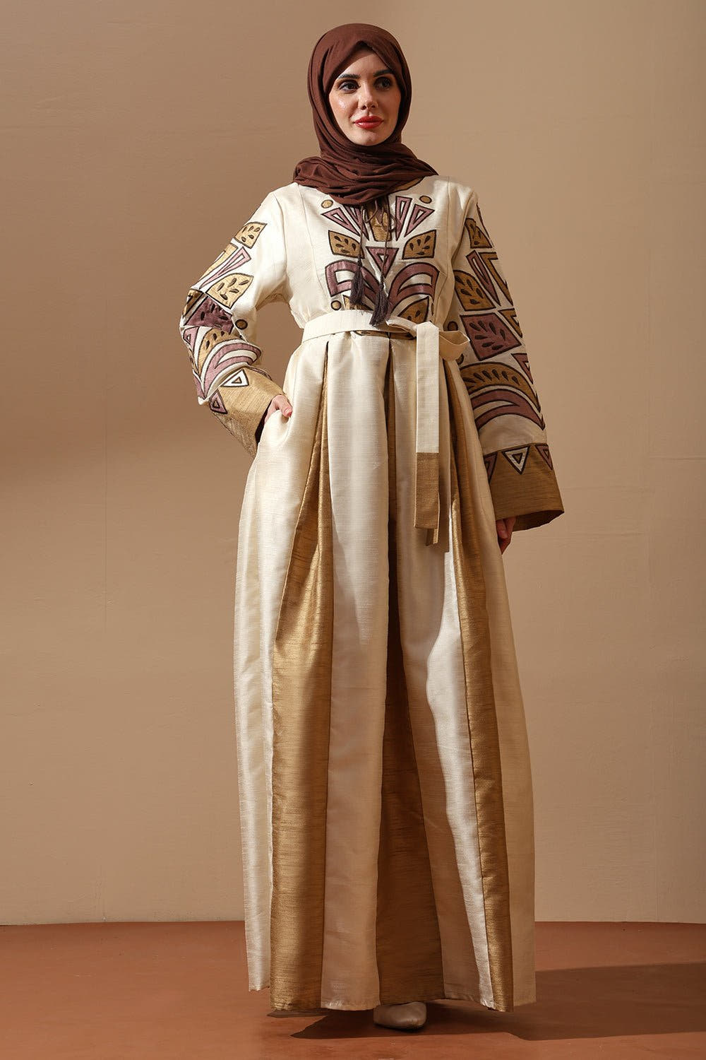 Regal Embroidered Silk Pleated Abaya in Ivory & Gold with Tribal Motif