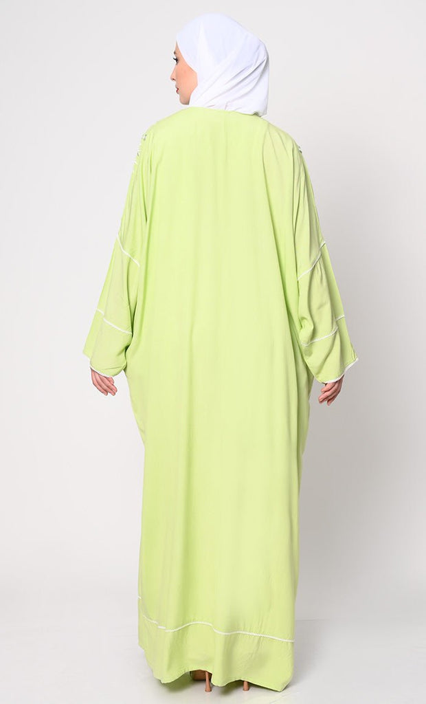 Royal Elegance: Women's Pista Green Kaftan with Embroidery and Foil Mirror Work - EastEssence.com