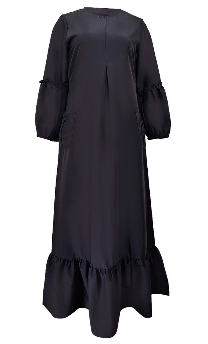 Abaya basique en Kashibo noir avec détails à volants sur les manches
