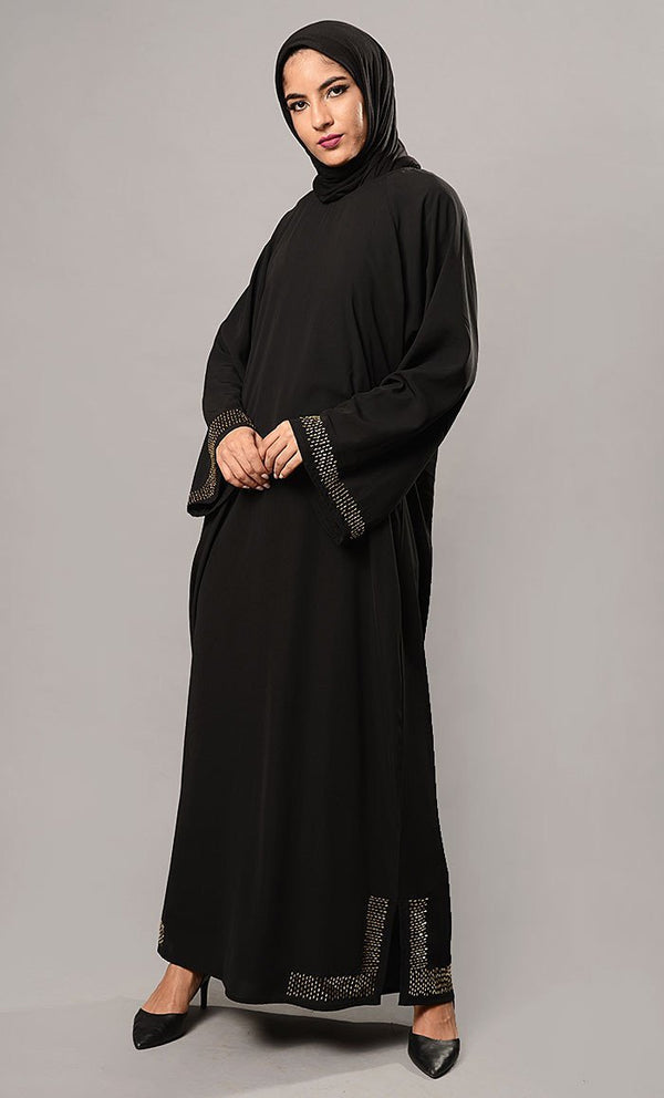 Eastessence presents Beads embroidered bell sleeves abaya dress available only at eastessence.com. XS / 56 / Black Eastessence presents Beads embroidered bell sleeves abaya dress available only at eastessence.com. XS / 56 / Black