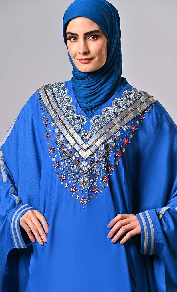 Elegance Embodied: Exquisite Embroidered Kaftan with Intricate Sleeve Trims - EastEssence.com