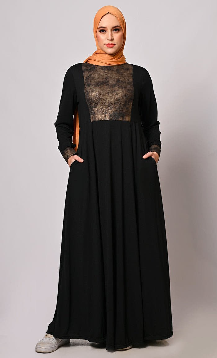 Abaya rehaussée de lurex avec poches pratiques