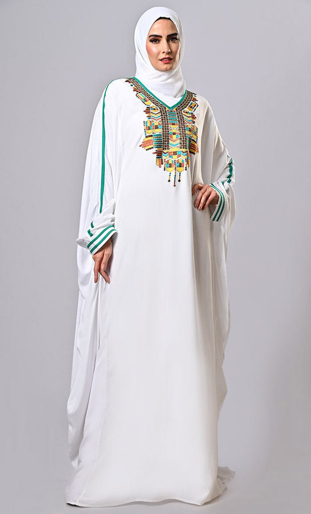 Pure Elegance: White Embroidered Abaya with Intricate Detailing - EastEssence.com