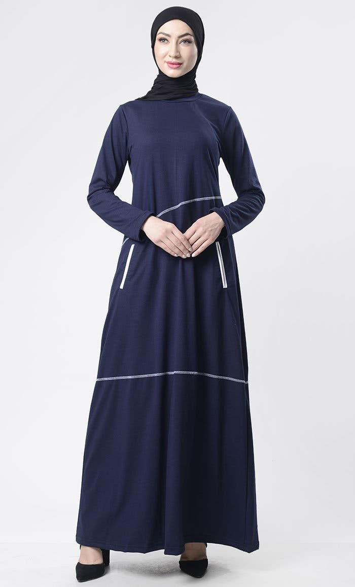 Abaya simple à surpiqûres détaillées avec poches