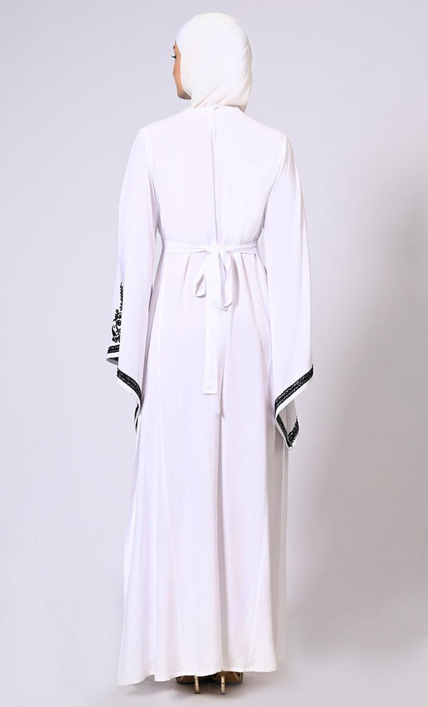 White Abaya with Bell Sleeves adorned in Hand & Machine Embroidery - EastEssence.com